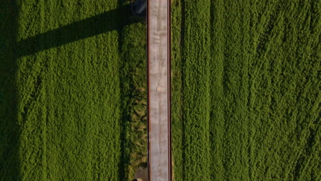 Bird's-Eye-View-On-Emsland-Transrapid-Test-Facility-In-Lathen,-Germany---aerial-drone-shot