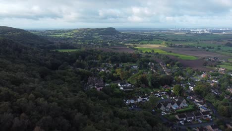 Aerial-view-above-Cheshire-North-England-viewpoint-out-across-Snowdonia-North-Wales-vast-countryside-rising-up