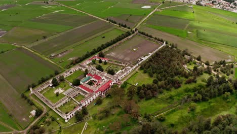Aerial-drone-orbit-around-luciernagas-estate-in-Mexico-City