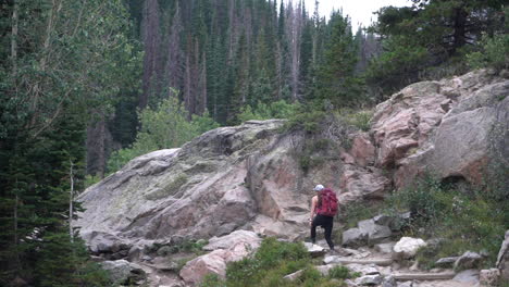 Female-HIker-WIth-Backpack-in-Pristine-Nature-of-Rocky-Mountains,-Colorado-USA