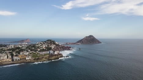 Drone-seascape-of-the-seaside-hill-bay-island,-Mazatlan-Mexico