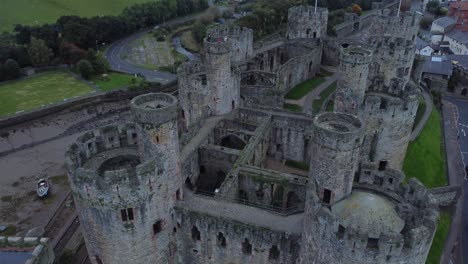 Medieval-Conwy-castle-walled-market-town-skeleton-remains-aerial-view-to-Birdseye