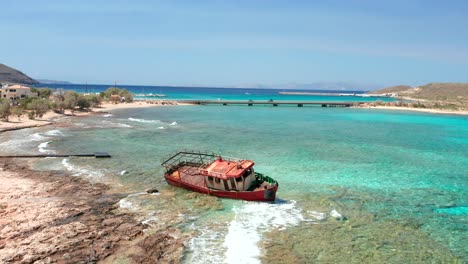 Diakofti-derelict-fishing-vessel,-rusted-after-beaching-in-seawater
