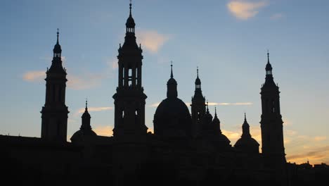 Camera-captures-the-silhouette-of-Cathedral-Basilica-of-Our-Lady-of-the-Pillar-during-sunset-in-a-bottom-up-shot
