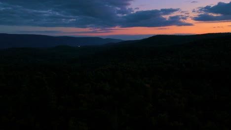 Magical-aerial-drone-sunset-to-dark-nightfall-time-lapse-hype-lapse-in-the-beautiful-Appalachian-mountains-with-colorful-skies-and-amazing-clouds-and-vast,-endless-forests