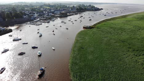 Beautiful-aerial-shot-of-moored-boats-at-Topsham-on-the-River-Exe-on-a-sunny-morning