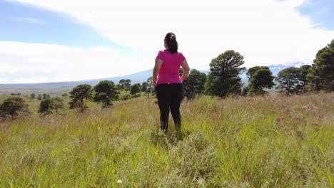 Young-latin-woman-with-overweight-enjoying-connecting-with-nature-after-hiking-on-the-woods-near-Puebla-Mexico