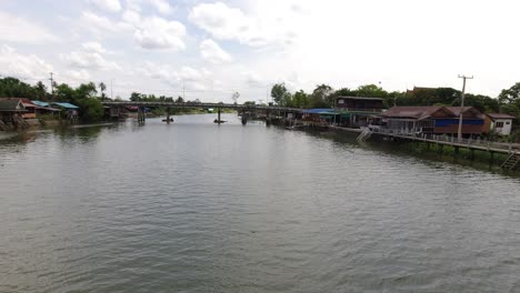 Static-Shot:-View-from-a-pedestrian-bridge-over-the-Mae-Klong-river-in-Thailand