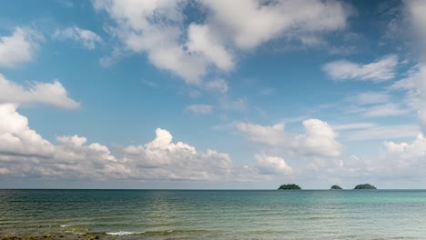 Timelapse-of-Cumulus-and-Cirrus-Clouds-Forming-Above-Coastal-Beach-on-the-Tropical-Island-of-Koh-Chang-in-Thailand