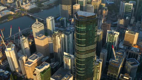 Aerial-View-of-Arise-Brisbane-Skytower-with-a-Beautiful-Morning-Sunlight,-Brisbane-Australia
