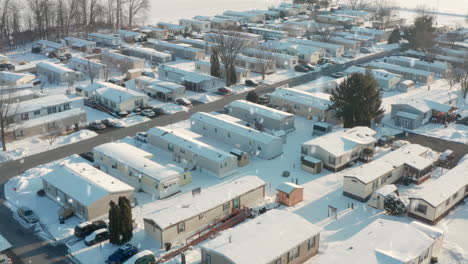 Snow-fall-in-winter-at-American-mobile-home,-trailer-park