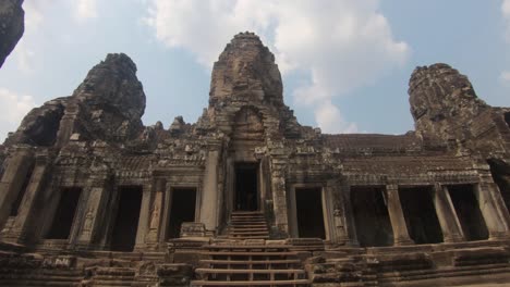 Wide-tilt-shot-showing-temple-runs-called-Angkor-Wat-in-Cambodia,-bright-sunny-day