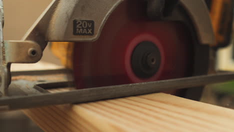 Sawing-Wood-Board-with-Circular-Saw,-Close-Up