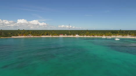 Aerial-drone-view-towards-the-Mano-Juan-village,-on-Saona-Island,-in-Dominican-Republic