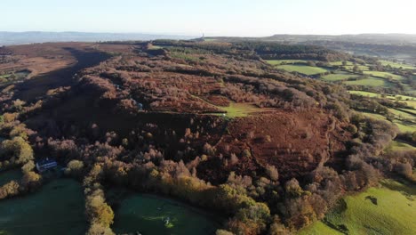 4K-Aerial-slow-descent-over-the-mountains-and-beautiful-green-rolling-hills-of-Culmstock-Beacon-in-the-Blackdown-Hills-of-Devon-England