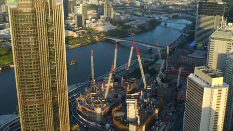 Construction-Progress-Of-Queen's-Wharf-At-The-Embankment-Of-Brisbane-River-With-View-Of-Victoria-Bridge-At-Sunset-In-Brisbane-Queensland
