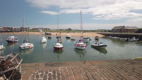 Historic-harbour-on-the-east-coast-of-Fife-Scotland-basking-in-the-sun-of-an-early-summer-day