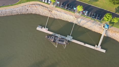 Aerial-descending-overhead-shot-of-the-Pinta-replica,-docked-on-the-Cumberland-River