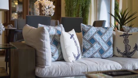 cushions-on-the-armchair-with-white-and-light-blue-anchor-designs