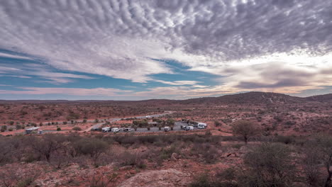 Time-lapse-of-gloomy-clouds-racing-across-the-sky-above-a-lonely-campsite-outside-of-Broken-Hill-in-outback-NSW