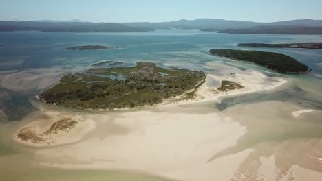 Aerial-views-of-Goat,-Horse-and-Rabbit-Islands-near-the-mouth-of-the-Wallagaraugh-River-at-Mallacoota-at-low-tide,-eastern-Victoria,-Australia,-December-2020