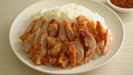 fried-pork-topped-on-rice-with-spicy-dipping-sauce
