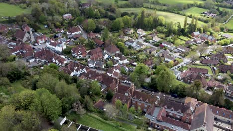 Spectacular-sweeping-aerial-drone-footage-of-a-small-village-in-England