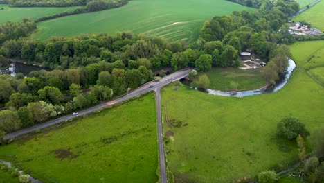 Aerial-footage-of-green-fields-and-country-roads