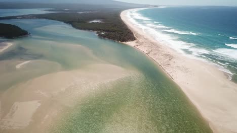 Aerial-view-of-the-mouth-of-the-Wallagaraugh-River-at-Mallacoota,-eastern-Victoria,-Australia,-December-2020