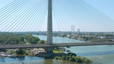 Ada-Bridge-in-Belgrade-Serbia,-aerial-view-of-cable-bridge-over-Sava-river