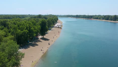 Aerial-view-of-an-artificial-sandy-beach-in-the-Sava-river-near-Belgrade