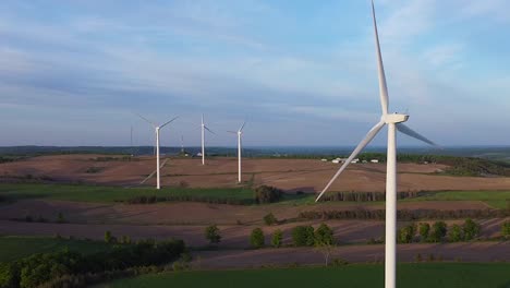 Aerial-of-renewable-sustainable-energy-wind-turbine-farms-on-fields