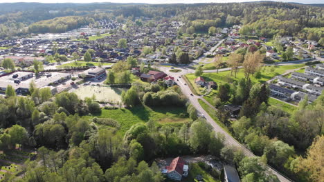 4K-Aerial-Footage-Rotating-Over-the-Town-of-Lerum-in-Vastra-Gotaland,-Sweden