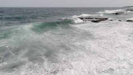 Waves-breaking-on-rocks-at-San-Gregorio-de-Nigua-in-Dominican-Republic