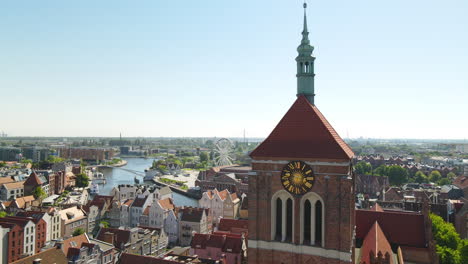 Aerial-View-Of-St-Bridget-Church-In-Old-Town-Gdansk-In-Poland-During-Daytime---drone-shot