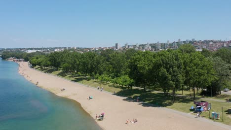 Aerial:-Ada-Ciganlija-in-Belgrade-Serbia,-riverside-summer-relaxing-place