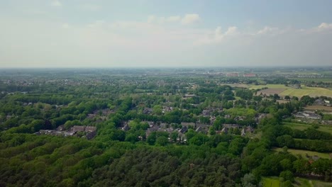Aerial-drone-view-of-the-green-suburban-near-the-forest-in-the-Netherlands