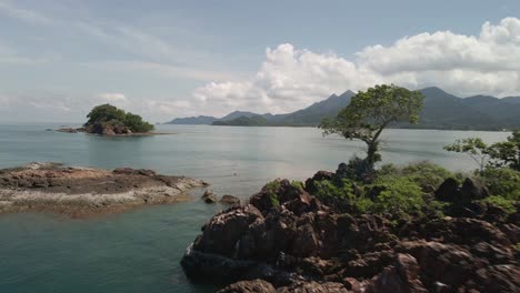 4K-Aerial-Drone-Footage-Over-Rocky-Island-Near-Koh-Chang-in-Thailand