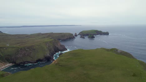 Flying-over-the-top-of-Carrowteige-cliffs-towards-the-ocean