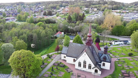 4K-Aerial-Footage-Overhead-Looking-Down-at-Church-in-Lerum,-Town-in-Vastra-Gotaland,-Sweden