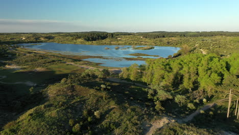 Aerial-of-Vogelmeer-with-sunset-in-National-park-Kennemerland