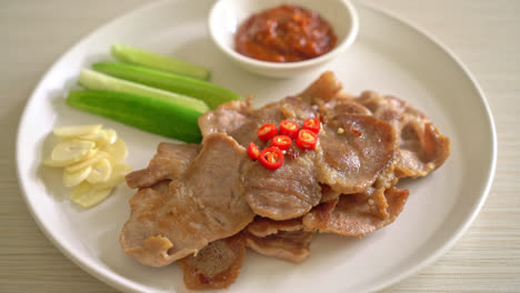 grilled-pork-neck-sliced-on-plate-in-Asian-style