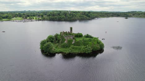 Aerial-view-of-McDermott's-castle-with-marina-and-boats-in-the-background