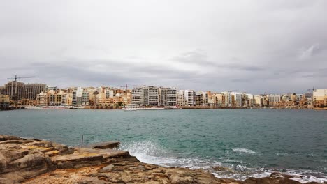 Timelapse-video-from-Malta,-Sliema-and-St-Julians-Bay-on-a-cloudy-and-windy-autumn-day