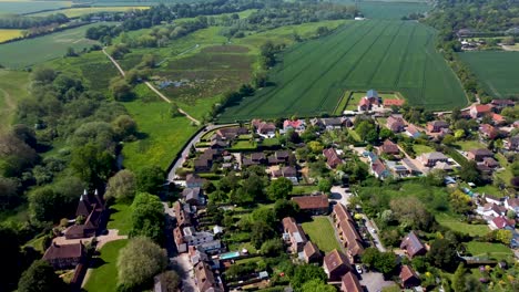 Aerial-footage-from-high-altitude-of-a-village-near-Canterbury