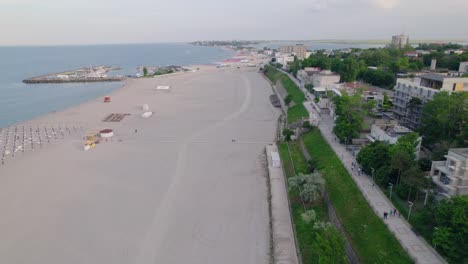 Drone-view-of-beach-and-ocean-with-waves