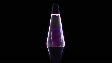 A-purple-lava-lamp-isolated-on-a-back-background