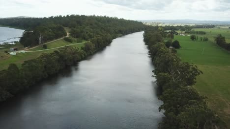 Aerial-footage-over-the-Snowy-River-between-Marlo-and-Orbost,-in-Gippsland,-Victoria,-Australia,-December-2020