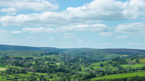 Time-Lapse-view-towards-Castleton,-North-York-Moors-National-Park,-Yorkshire,-clouds-in-the-summer-sun