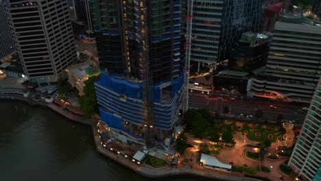 Descending-aerial-view-of-443-Queen-Street-building-being-Built,-Brisbane,-Australia